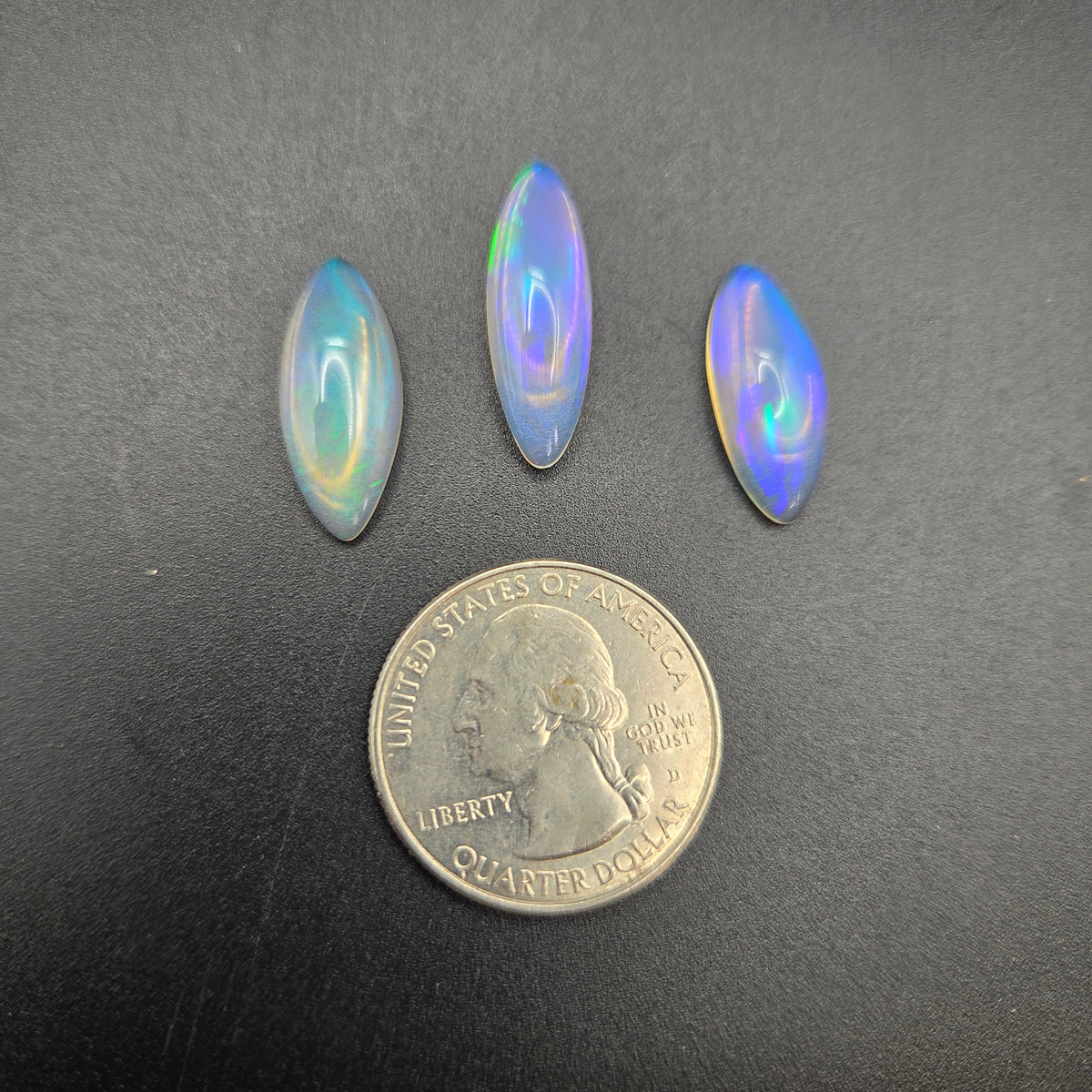 Close-up of Welo Opal Cabochons 3 Piece Set
