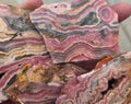 Argentine Rhodochrosite (Sold by the Gram) — natural mineral specimen