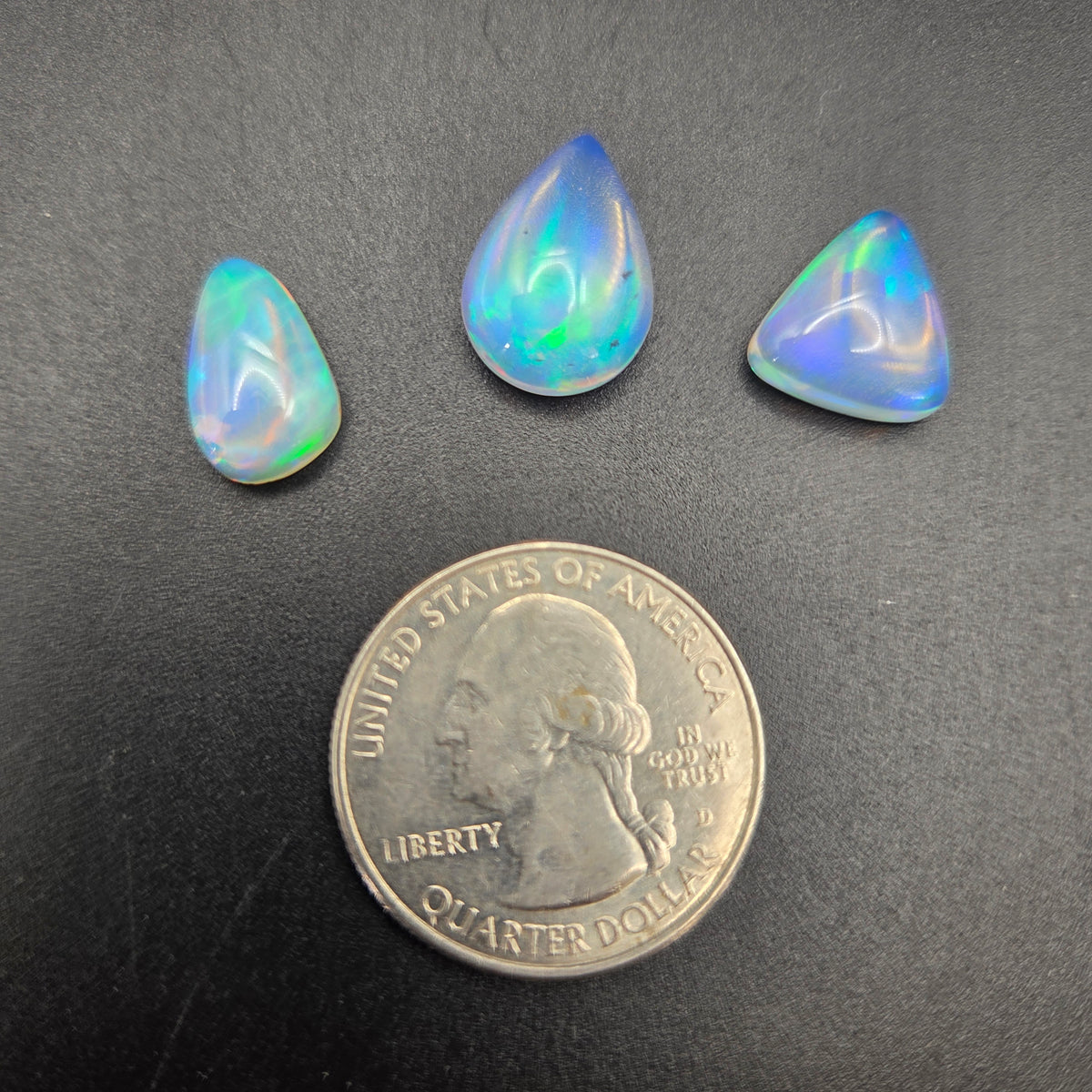 Close-up of Welo Opal Cabochons 3 Piece Set